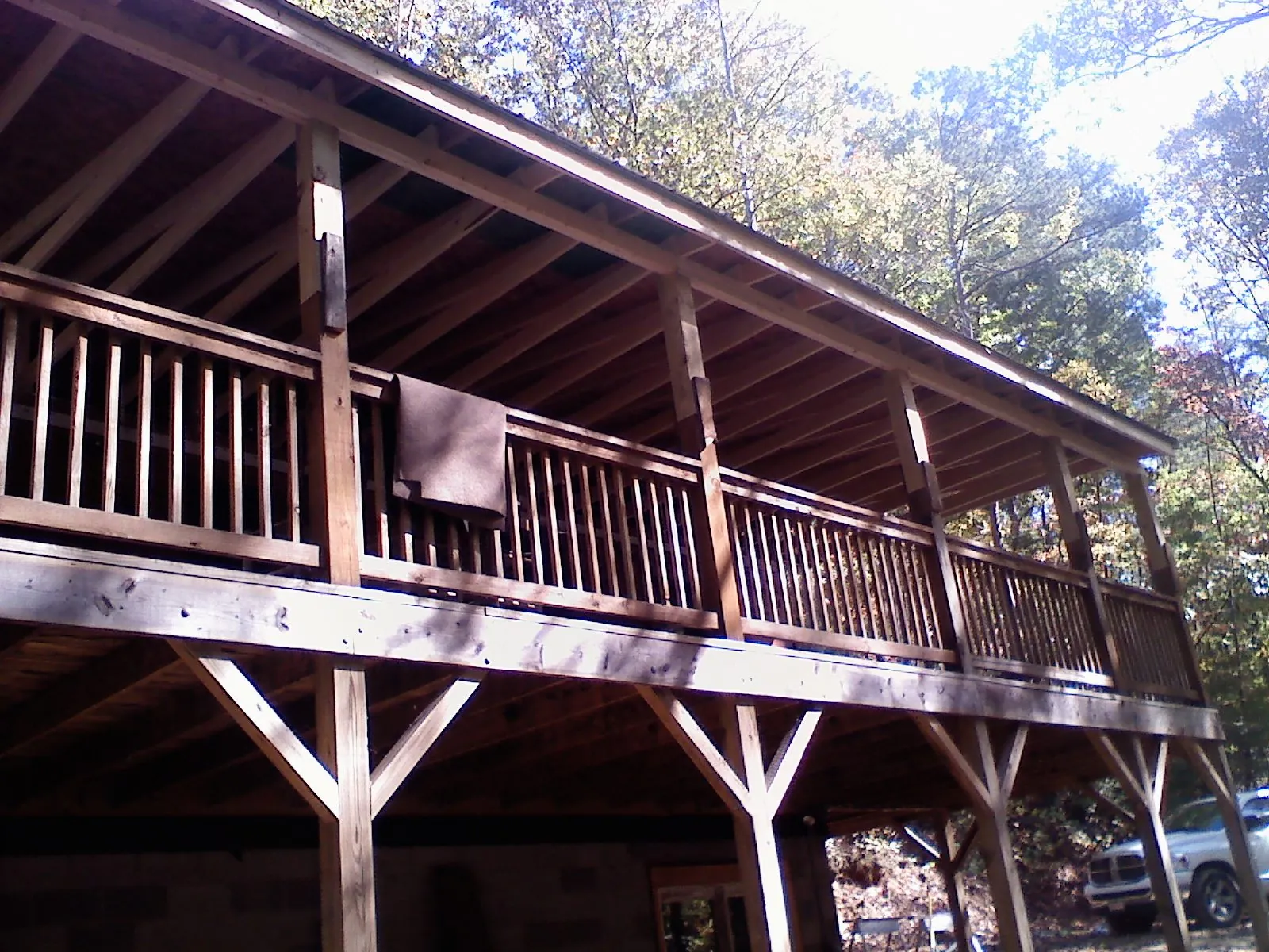 Timber framing under a new elevated porch and deck — Roof Leak Repair in Gleneden Beach by Roofing Brothers